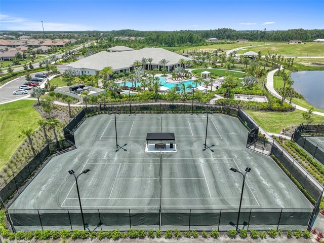 4709 Isonzo Way, Wesley Chapel, FL 33543 - bird's eye view of a pool area and a large body of water