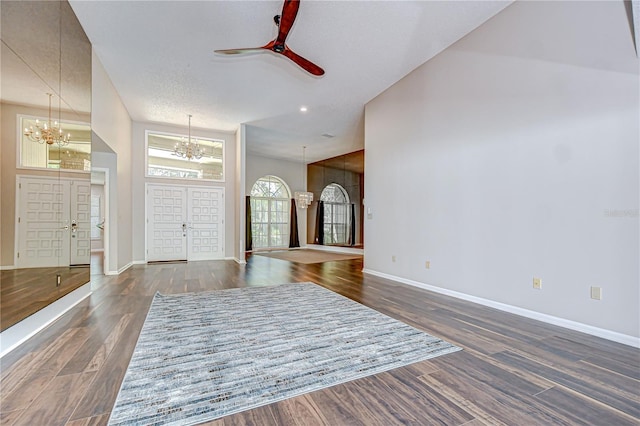 17917 Clear Lake Dr, Lutz, FL 33548 - entryway with a chandelier, wood finished floors, and baseboards