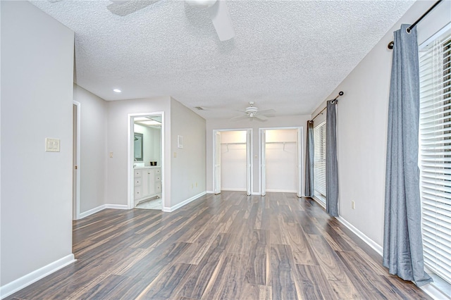 17917 Clear Lake Dr, Lutz, FL 33548 - spare room featuring ceiling fan, wood finished floors, baseboards, and a textured ceiling