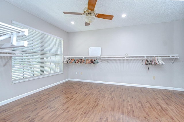 17917 Clear Lake Dr, Lutz, FL 33548 - spacious closet featuring wood finished floors and a ceiling fan