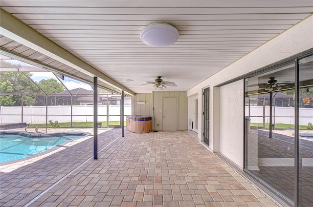 17917 Clear Lake Dr, Lutz, FL 33548 - view of swimming pool with a ceiling fan, a patio, and glass enclosure