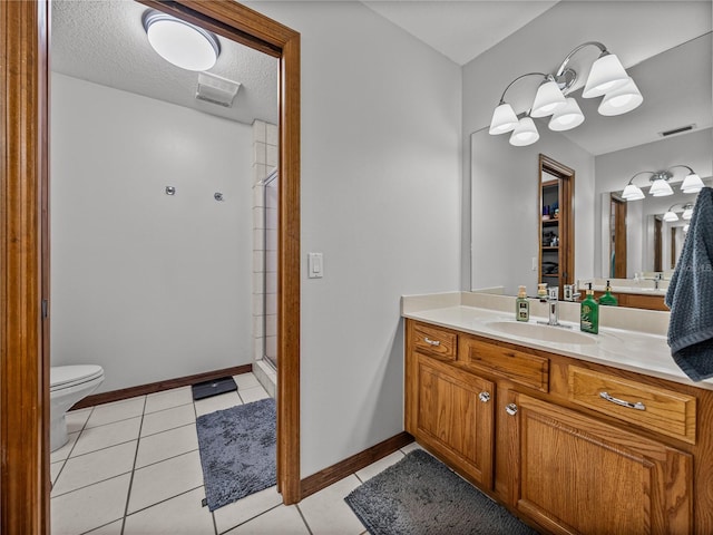 16326 Kalli Way, Dade City, FL 33523 - full bathroom featuring a stall shower, vanity, toilet, tile patterned floors, and baseboards