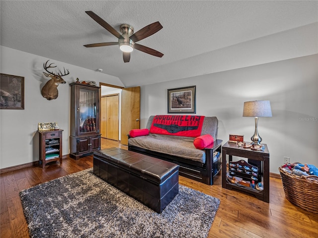 16326 Kalli Way, Dade City, FL 33523 - living area with ceiling fan, hardwood / wood-style floors, baseboards, and a textured ceiling