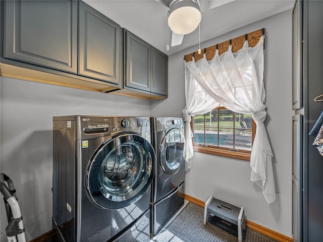 16326 Kalli Way, Dade City, FL 33523 - washroom with cabinet space, washer and dryer, and baseboards