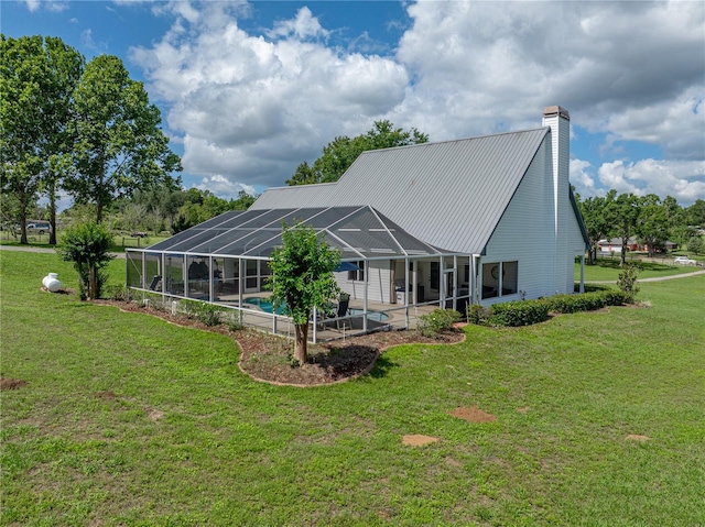 16326 Kalli Way, Dade City, FL 33523 - back of house featuring an outdoor pool, a lawn, and a patio