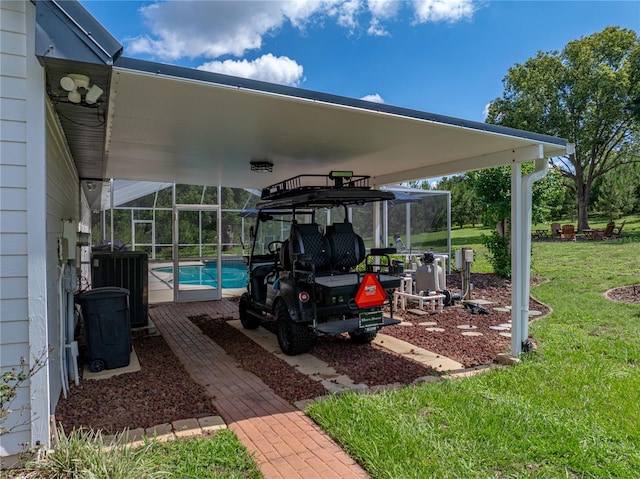 16326 Kalli Way, Dade City, FL 33523 - view of patio / terrace with central AC, an outdoor pool, and glass enclosure