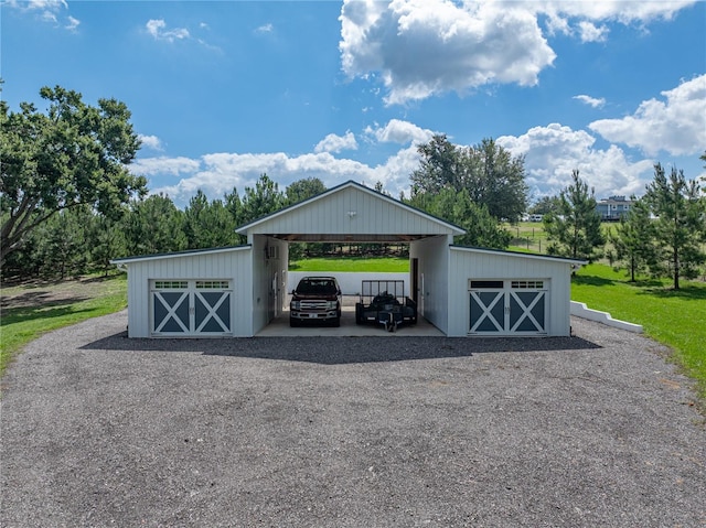 16326 Kalli Way, Dade City, FL 33523 - garage with a carport and driveway
