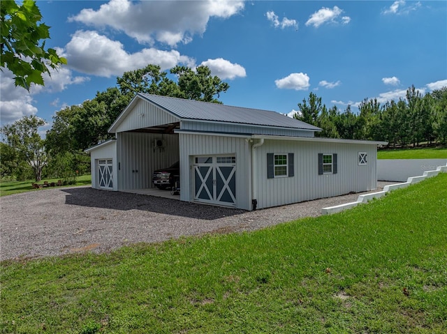 16326 Kalli Way, Dade City, FL 33523 - view of pole building featuring a lawn