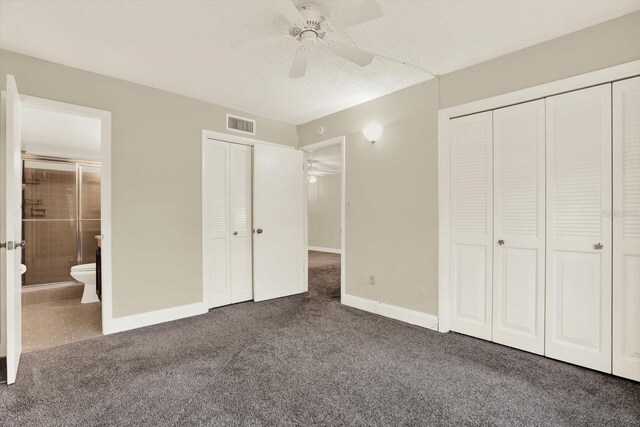 4801 Airport Rd Unit 210, Zephyrhills, FL 33542 - unfurnished bedroom featuring carpet, ensuite bath, baseboards, a ceiling fan, and a textured ceiling