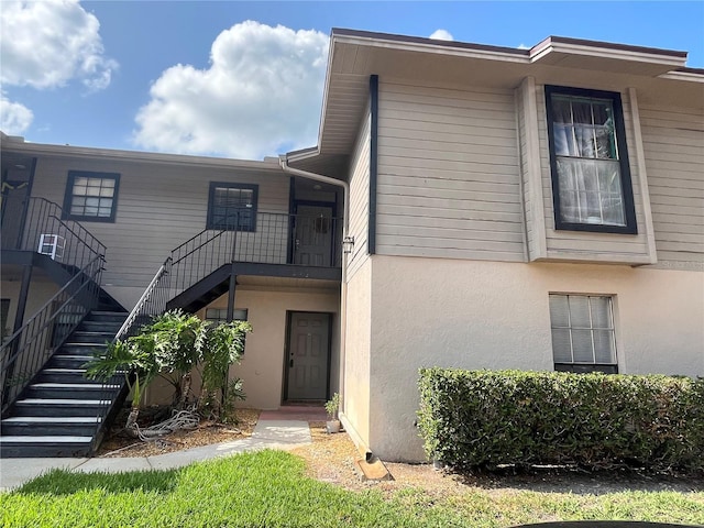4008 Ashford Green Pl Unit F101, Tampa, FL 33613 - view of building exterior featuring stairs