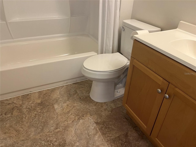 4008 Ashford Green Pl Unit F101, Tampa, FL 33613 - full bath featuring vanity, toilet, shower / tub combo, and stone finish floors
