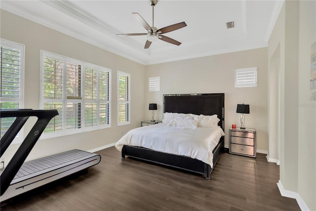 13872 Siena Loop, Lakewood Ranch, FL 34202 - bedroom featuring a tray ceiling, wood finished floors, baseboards, ornamental molding, and a ceiling fan