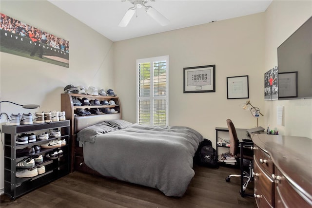 13872 Siena Loop, Lakewood Ranch, FL 34202 - bedroom with dark wood-style floors, a ceiling fan, and an office area