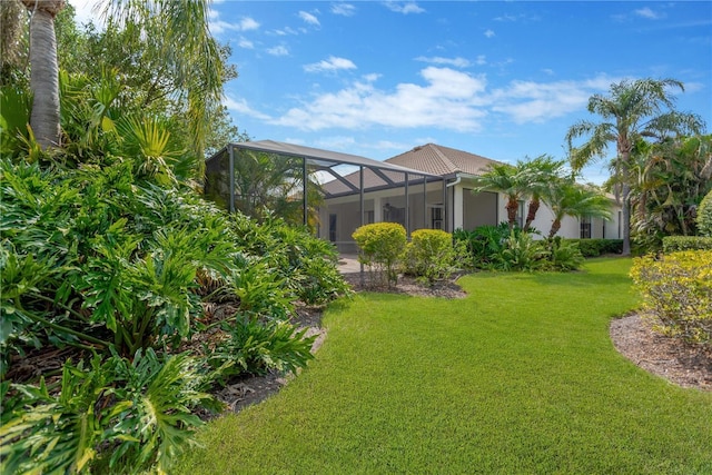 13872 Siena Loop, Lakewood Ranch, FL 34202 - view of green lawn featuring a lanai