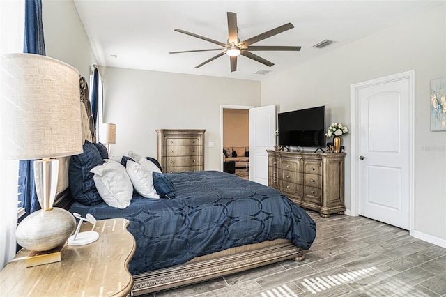 2515 63rd Ter E, Ellenton, FL 34222 - bedroom featuring wood tiled floors and a ceiling fan