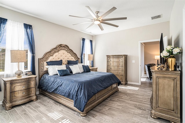 2515 63rd Ter E, Ellenton, FL 34222 - bedroom with wood tiled floors, baseboards, and ceiling fan