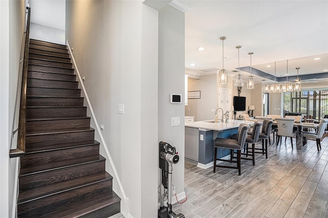 2515 63rd Ter E, Ellenton, FL 34222 - stairs featuring wood finished floors, baseboards, and recessed lighting