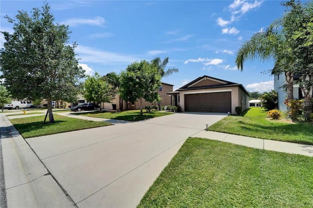 11121 Hudson Hills Ln, Riverview, FL 33579 - view of front of home with concrete driveway, a front yard, an attached garage, and stucco siding