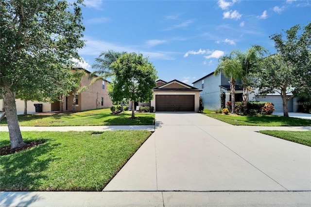 11121 Hudson Hills Ln, Riverview, FL 33579 - obstructed view of property featuring concrete driveway, a front lawn, and an attached garage