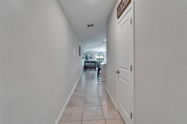 11121 Hudson Hills Ln, Riverview, FL 33579 - corridor featuring light tile patterned floors and baseboards
