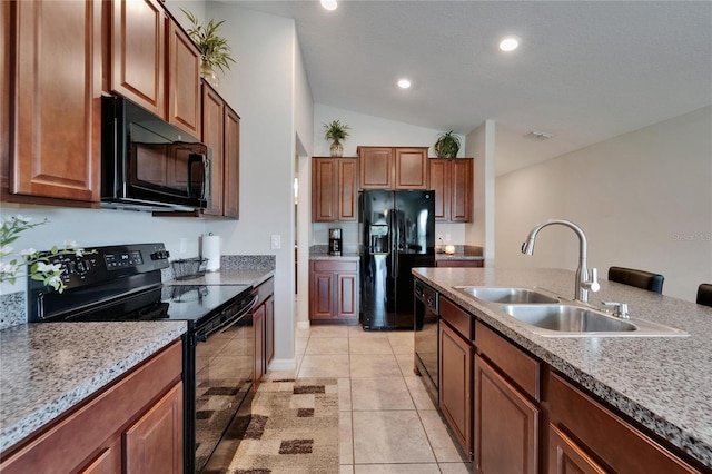 11121 Hudson Hills Ln, Riverview, FL 33579 - kitchen with black appliances, a sink, vaulted ceiling, recessed lighting, and light tile patterned floors