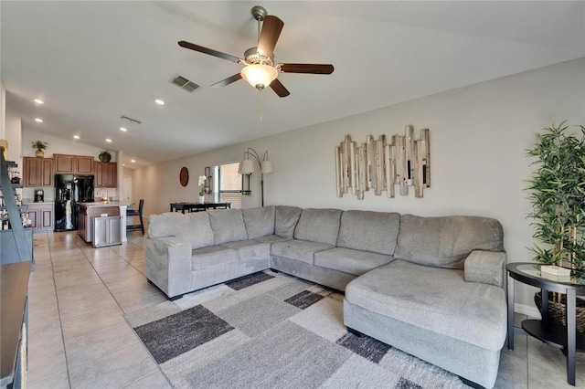 11121 Hudson Hills Ln, Riverview, FL 33579 - living room with ceiling fan, lofted ceiling, recessed lighting, and light tile patterned floors