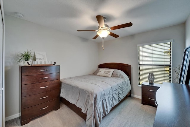 11121 Hudson Hills Ln, Riverview, FL 33579 - bedroom featuring light colored carpet, baseboards, and a ceiling fan