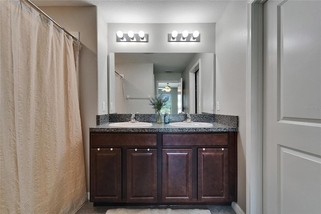 11121 Hudson Hills Ln, Riverview, FL 33579 - full bathroom featuring double vanity and ceiling fan