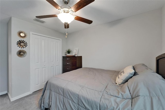 11121 Hudson Hills Ln, Riverview, FL 33579 - carpeted bedroom with a closet and ceiling fan