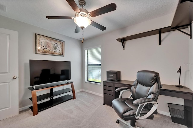 11121 Hudson Hills Ln, Riverview, FL 33579 - office area featuring light carpet, ceiling fan, and a textured ceiling