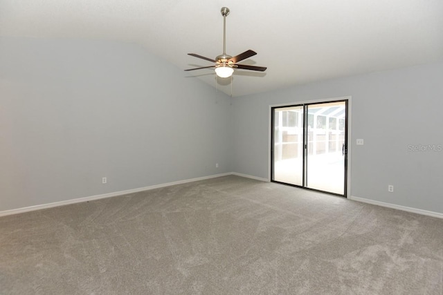 24 Lake Vista Way, Ormond Beach, FL 32174 - spare room with vaulted ceiling, light colored carpet, a ceiling fan, and baseboards