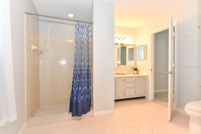 24 Lake Vista Way, Ormond Beach, FL 32174 - full bath with a tile shower, vanity, toilet, and baseboards