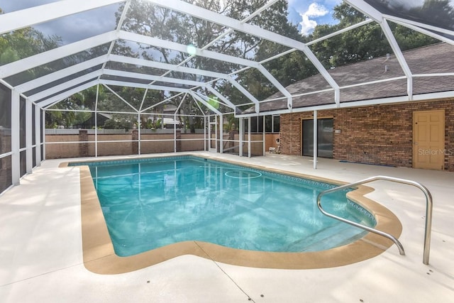 24 Lake Vista Way, Ormond Beach, FL 32174 - outdoor pool featuring a patio area, a fenced backyard, and a lanai