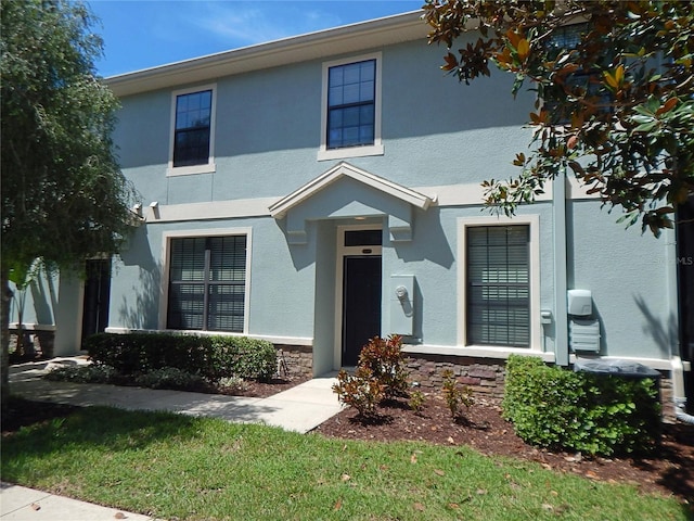 16618 Kingletside Ct, Lithia, FL 33547 - view of front facade featuring stucco siding