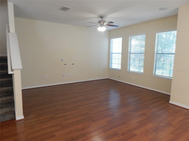 16618 Kingletside Ct, Lithia, FL 33547 - empty room featuring a ceiling fan, dark wood-type flooring, and baseboards