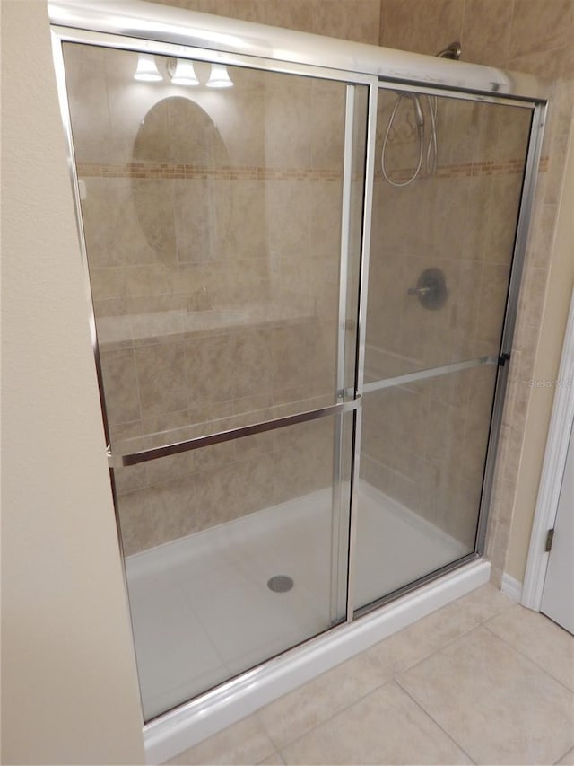 16618 Kingletside Ct, Lithia, FL 33547 - bathroom featuring a shower stall and tile patterned flooring