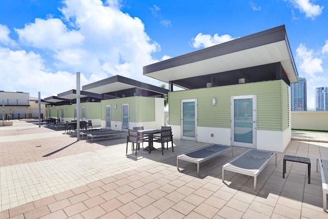 1120 E Kennedy Blvd Unit 1127, Tampa, FL 33602 - view of patio / terrace featuring outdoor dining space