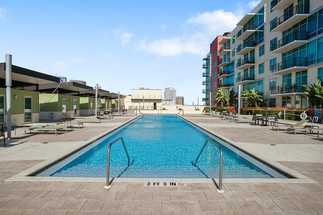 1120 E Kennedy Blvd Unit 1127, Tampa, FL 33602 - community pool with a patio area
