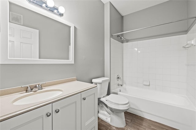 9416 Lake Chase Island Way Unit 9416, Tampa, FL 33626 - full bath featuring vanity, wood finished floors, shower / tub combination, and toilet