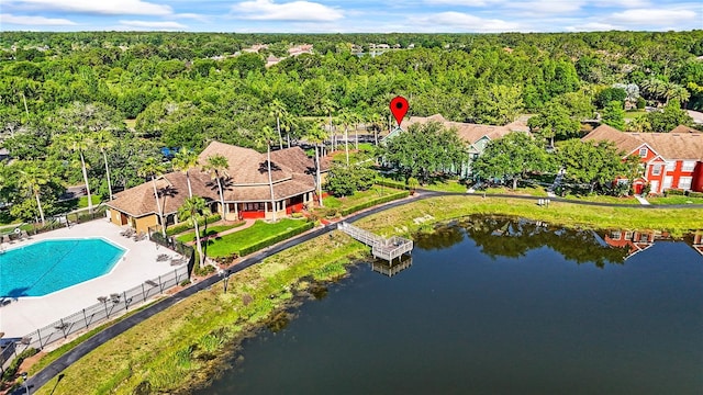 9416 Lake Chase Island Way Unit 9416, Tampa, FL 33626 - aerial view of a heavily wooded area, a large body of water, and a pool