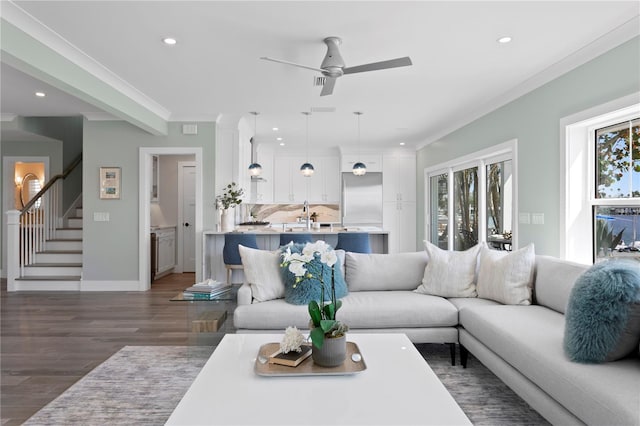 2903 Pass A Grille Way, St Pete Beach, FL 33706 - living area featuring recessed lighting, dark wood-style floors, a ceiling fan, stairs, and ornamental molding