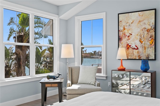 2903 Pass A Grille Way, St Pete Beach, FL 33706 - bedroom with wood finished floors, baseboards, and a water view