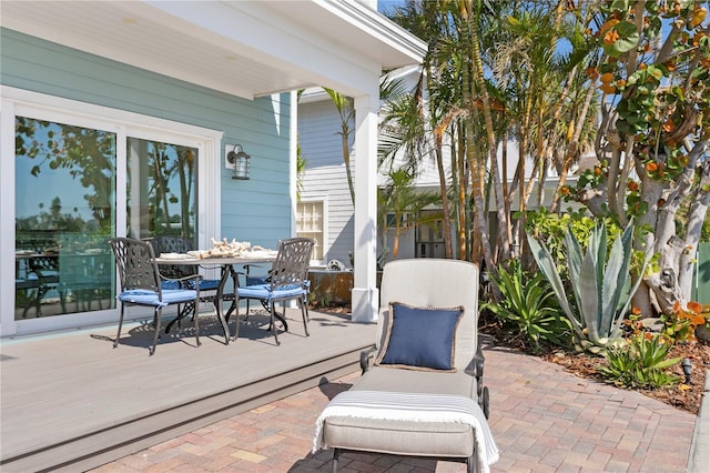 2903 Pass A Grille Way, St Pete Beach, FL 33706 - view of patio / terrace featuring outdoor dining space and a deck