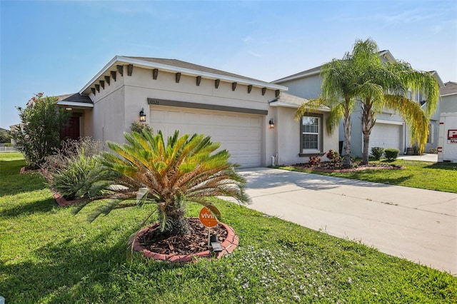10326 Boggy Moss Dr, Riverview, FL 33578 - mediterranean / spanish house featuring a garage, stucco siding, a front lawn, and concrete driveway
