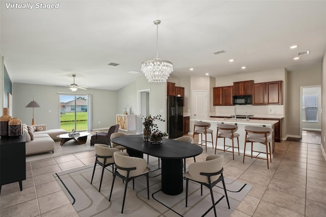 10326 Boggy Moss Dr, Riverview, FL 33578 - dining space featuring light tile patterned floors, ceiling fan, a chandelier, recessed lighting, and baseboards