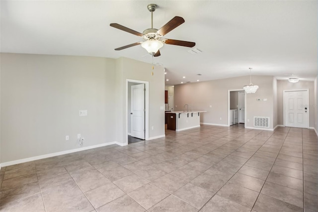 10326 Boggy Moss Dr, Riverview, FL 33578 - unfurnished living room featuring ceiling fan, light tile patterned floors, a sink, recessed lighting, and baseboards