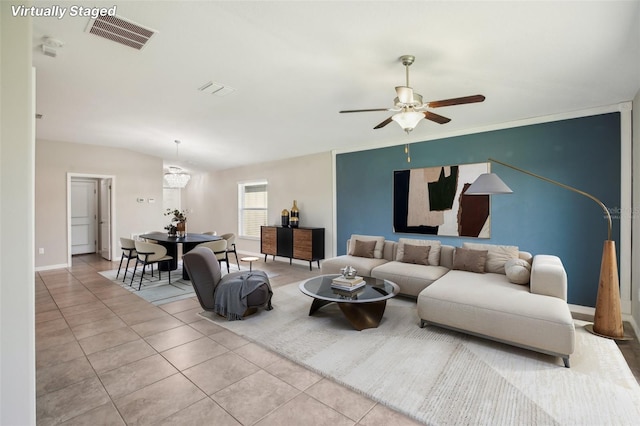 10326 Boggy Moss Dr, Riverview, FL 33578 - living area with tile patterned flooring, ceiling fan, and baseboards