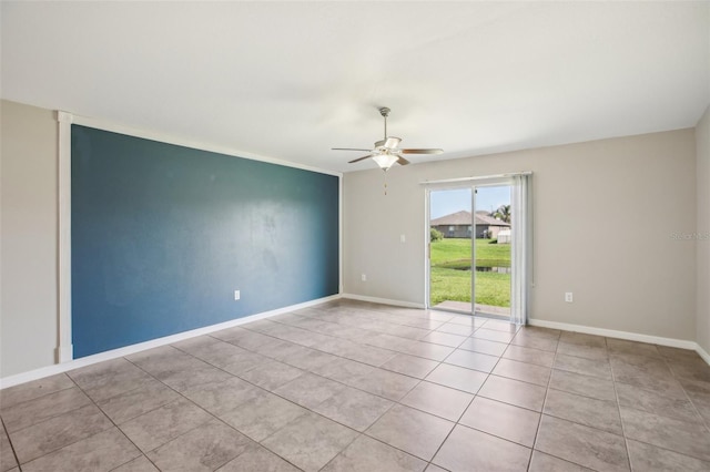 10326 Boggy Moss Dr, Riverview, FL 33578 - empty room featuring ceiling fan, tile patterned flooring, and baseboards