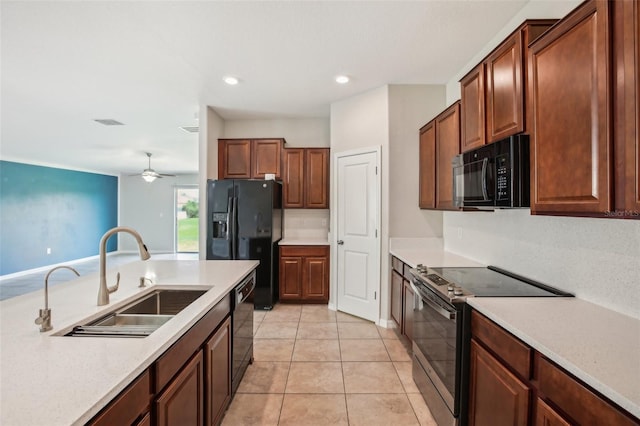10326 Boggy Moss Dr, Riverview, FL 33578 - kitchen featuring black appliances, a sink, light countertops, a ceiling fan, and light tile patterned flooring