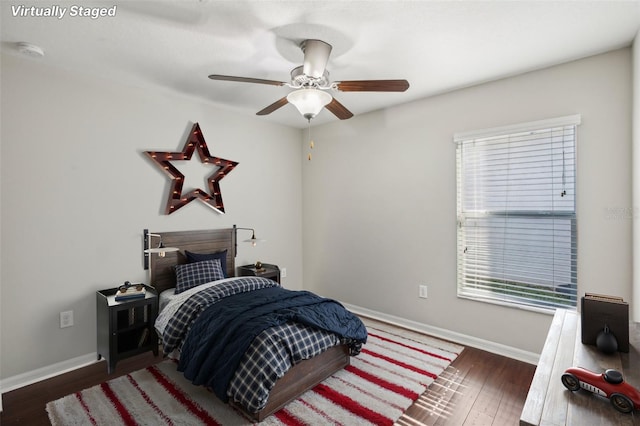 10326 Boggy Moss Dr, Riverview, FL 33578 - bedroom with wood finished floors, baseboards, and ceiling fan